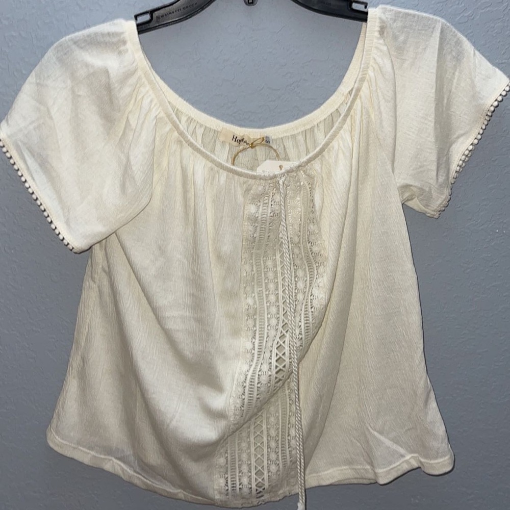 white short sleeve with tassel